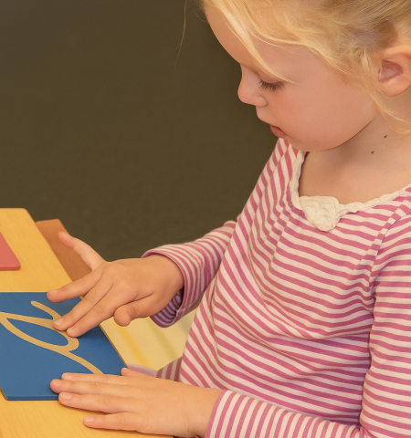 Why Montessori Uses Cursive Letters First — and Why It Matters