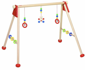 Montessori baby gym with red rings and colorful wooden beads for sensory development